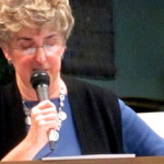 Van Kirk speaking at one of her many author events.